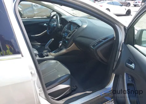 2012 Ford Focus Sel z USA, uszkodzony, nr VIN 1FAHP3H27CL124734